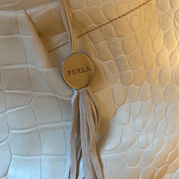 Gently used furla bag , few discoloration that can be fixed